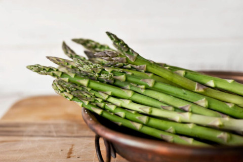 Asparagus spears in metal bowl